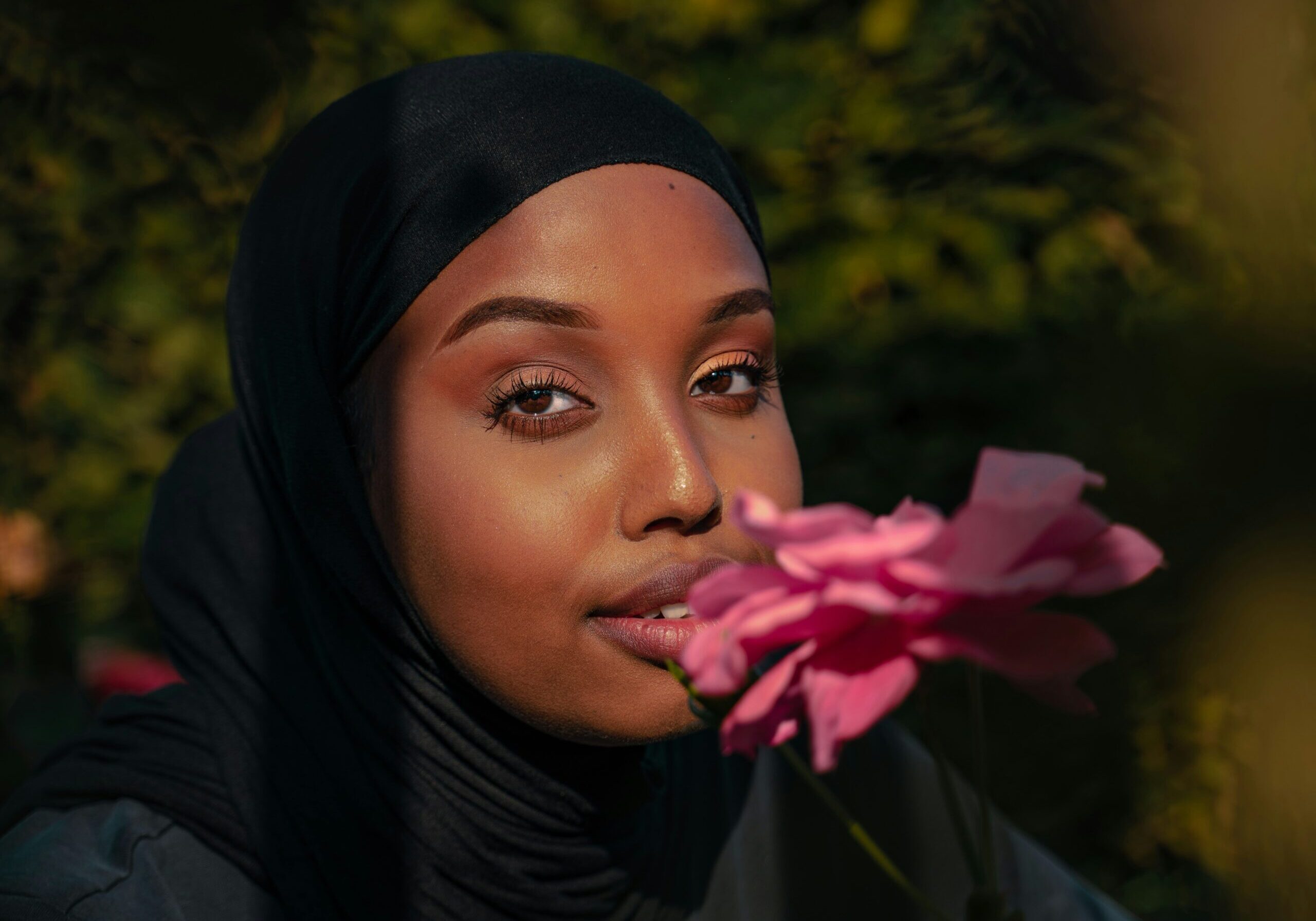 Image of a woman with a flower.